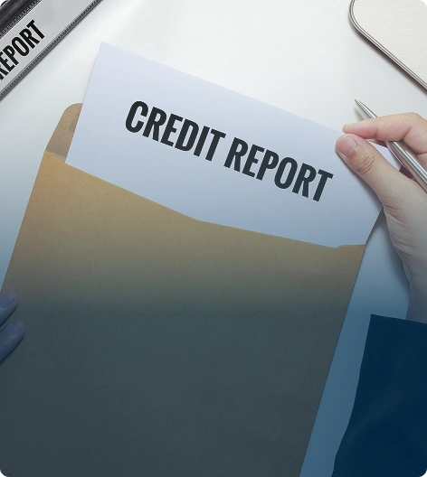 A hand pulling a document labeled 'Credit Report' out of a folder.